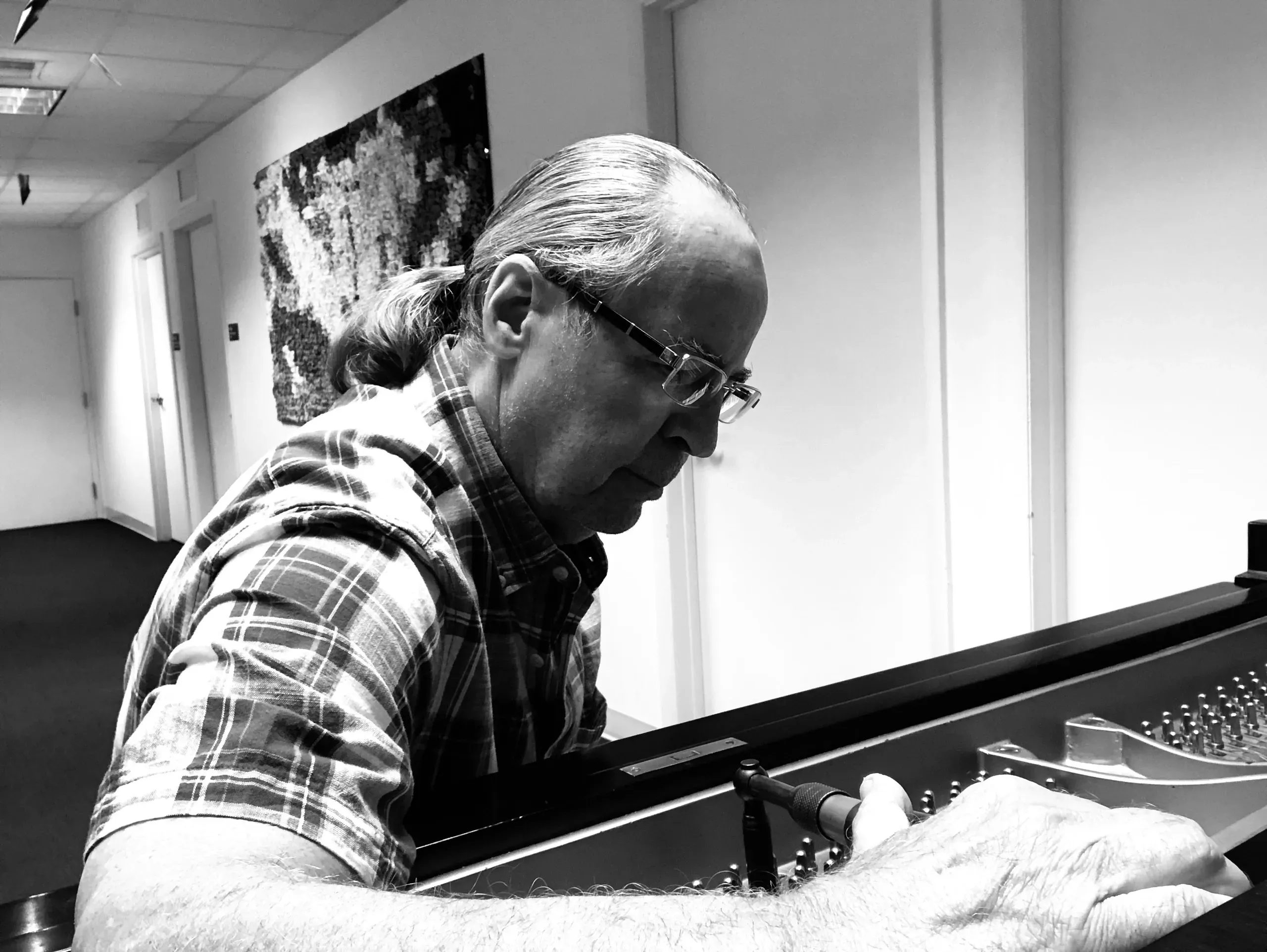 Marty Karmiol at work, black and white