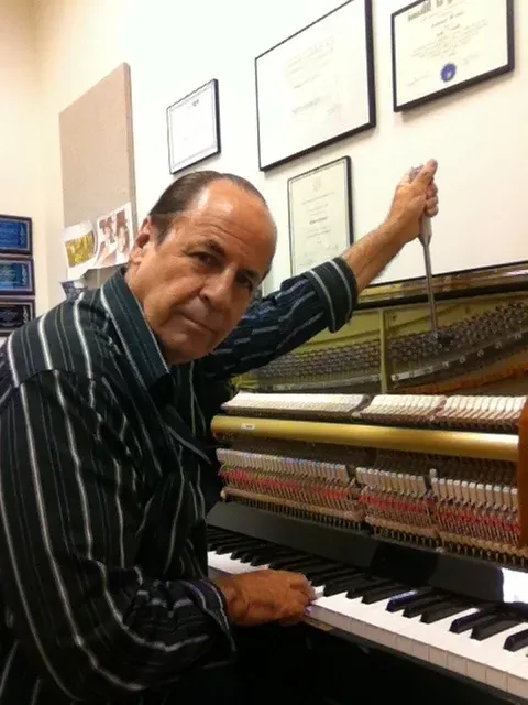 Marty Karmiol, certified piano tuner with over 43 years of experience